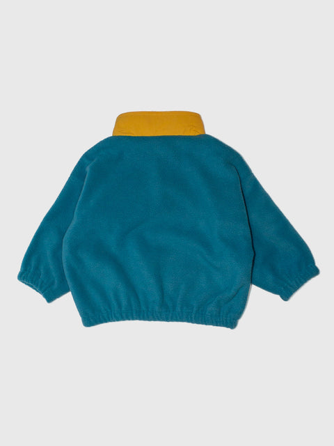 Teal sweater with yellow collar on a white background