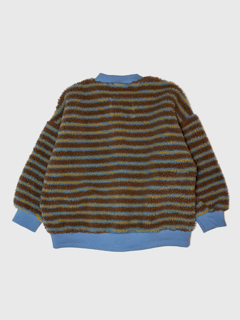 Striped sweater with brown and blue pattern on a white background