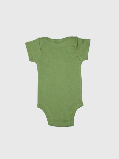 Green baby onesie on a light gray background