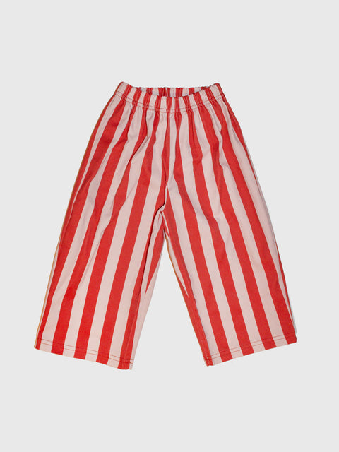 Red and white vertically striped cropped pants with an elastic waistband, shown flat against a light gray background.