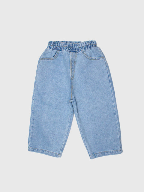 Light blue denim pants on a white background